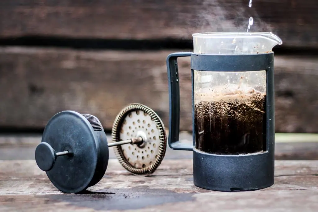 french press blooming for the perfect cup of coffee - Steps to making the best french press coffee