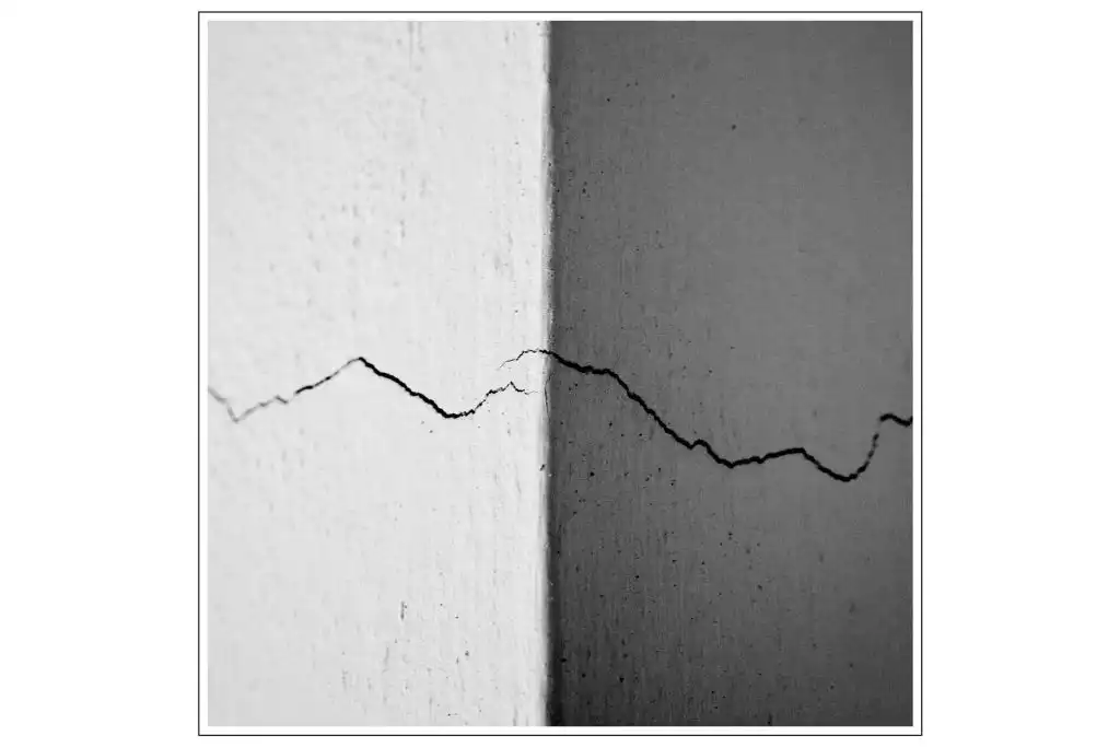 Cracks in our walls. Shows the offense causes division. 