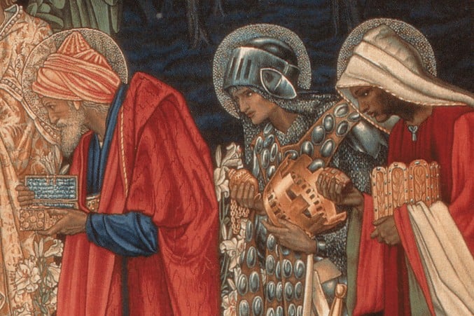 The wise men giving gifts of gold, frankincense, and myrrh