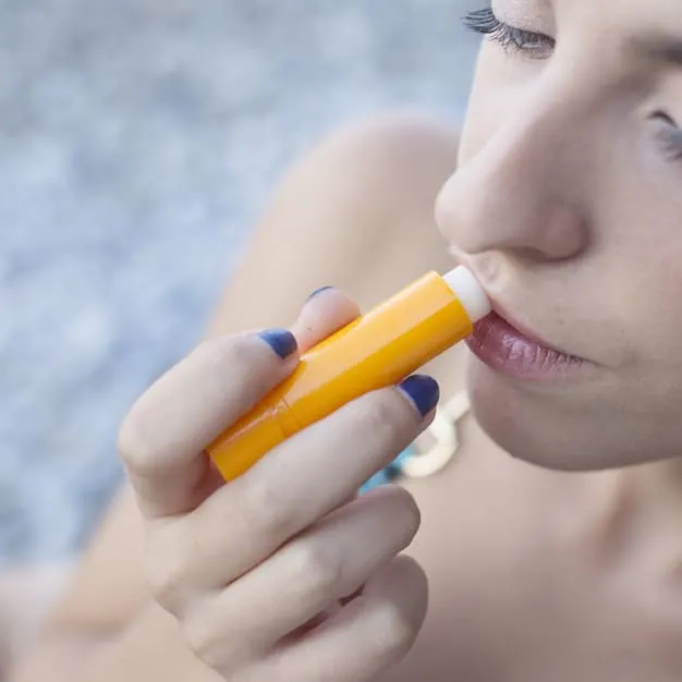 Applying-Lip-Balm