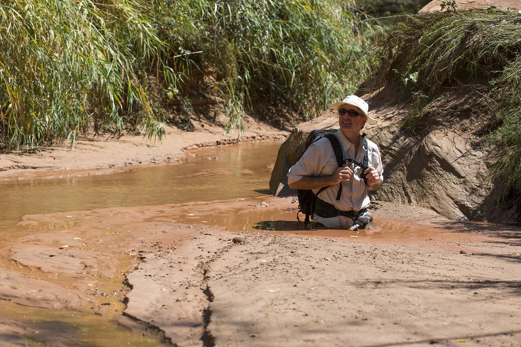 man stuck in quicksand