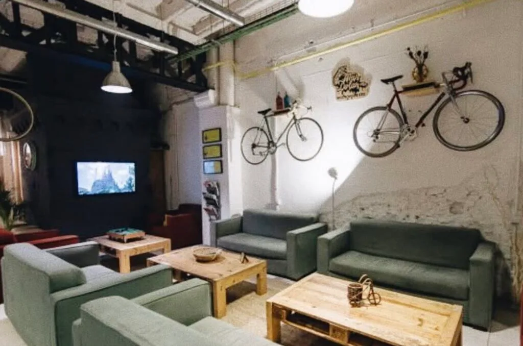 Vintage bike wall decor in cozy living room with modern furniture and rustic accents.