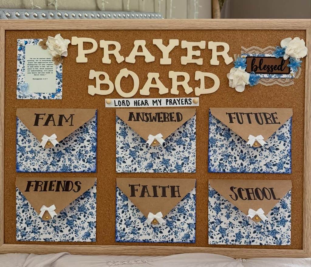 Decorative prayer board with labeled envelopes for family, friends, faith, and school.